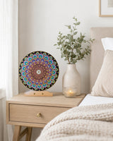 Aurum Bloomless original hand-painted dot mandala artwork displayed on a bedside table in a soft neutral bedroom by Sweet Lilly Loves