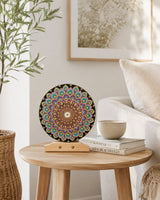 Aurum Bloomless original round mandala artwork displayed on a small side table in a bright neutral interior by Sweet Lilly Loves