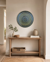 Buddy Light Forever original turquoise and gold mandala artwork displayed above a timber console cabinet by Sweet Lilly Loves
