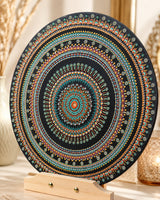 Copper Jewel hand-painted copper, teal and blue dot mandala artwork displayed on a wooden stand by Sweet Lilly Loves