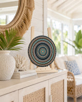 Copper Jewel copper and teal mandala artwork displayed on a timber stand on a bright console table by Sweet Lilly Loves