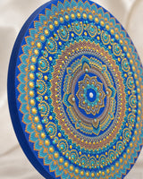 Detailed close-up of Divine Tide of Gold blue and gold circular dot mandala artwork by Sweet Lilly Loves