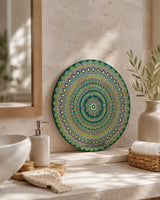 Emerald Echo Aurelia original round mandala artwork displayed on a sideboard in a light neutral room by Sweet Lilly Loves