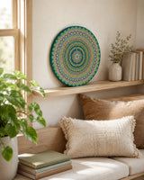 Emerald Echo Aurelia green and gold dot mandala artwork displayed in a soft neutral lounge setting by Sweet Lilly Loves