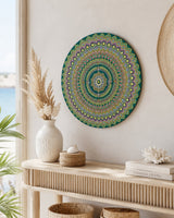 Emerald Echo Aurelia green, teal and gold mandala artwork displayed on a stand in a styled shelf setting by Sweet Lilly Loves