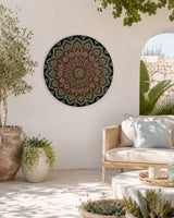 Empress Energy hand-painted dot mandala wall art displayed in a light patio seating area by Sweet Lilly Loves