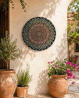 Empress Energy original hand-painted dot mandala artwork displayed on a sunlit courtyard wall by Sweet Lilly Loves