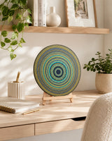 Golden Eclipse round dot mandala artwork displayed on a shelf with books and neutral decor by Sweet Lilly Loves
