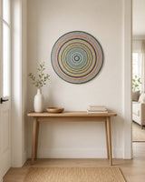Golden Orange Orb original round dot mandala artwork displayed above a slim timber entry table by Sweet Lilly Loves
