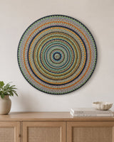Golden Orange Orb original orange, teal and gold dot mandala artwork displayed above a natural timber console by Sweet Lilly Loves
