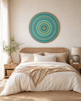 Inner Pulse round dot mandala wall art displayed above a softly styled neutral bed by Sweet Lilly Loves