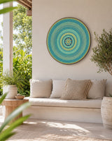 Inner Pulse original turquoise and gold mandala artwork displayed above a soft neutral sofa by Sweet Lilly Loves