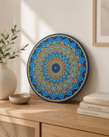 Just Blooming Golden Blue round dot mandala artwork displayed on a timber dresser with neutral decor by Sweet Lilly Loves