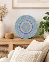 Ocean Whisper original round mandala artwork displayed above a light timber cabinet in a soft neutral lounge by Sweet Lilly Loves