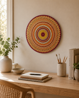 Sunset Warm Winter Fire round mandala artwork displayed on a timber desk with books and neutral decor by Sweet Lilly Loves