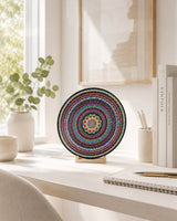 The Happy Centre hand-painted dot mandala artwork displayed on a stand on a bright window ledge by Sweet Lilly Loves