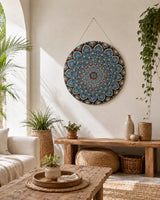 The Opulent Eye original round mandala artwork displayed above a timber console in a light outdoor setting by Sweet Lilly Loves