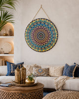 The Peacock Empress blue, pink and gold dot mandala wall art displayed above a soft neutral sofa by Sweet Lilly Loves