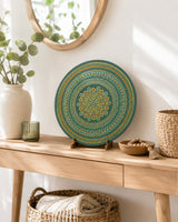 Verdant Glow original round mandala artwork displayed on a light console table in a bright neutral room by Sweet Lilly Loves