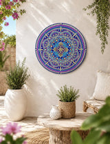 Vivid Devotion blue and purple and gold mandala wall art displayed in a sunlit courtyard setting by Sweet Lilly Loves